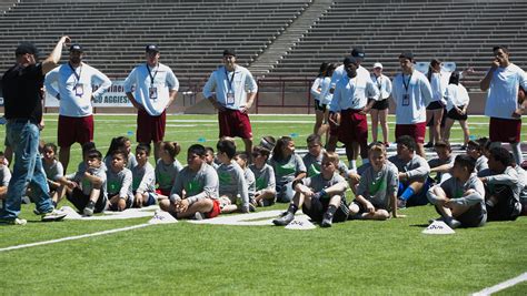 Brooks Teammates For Kids Conduct Youth Football Camp