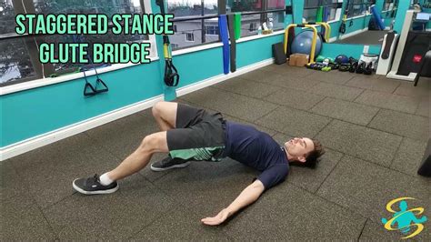 Staggered Stance Glute Bridge Exercise Library Youtube