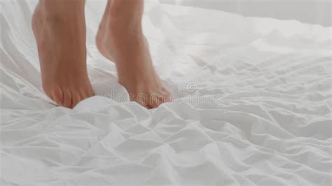 closeup shot of female feet lying in bed under duvet stock video video of indoors room 228026787