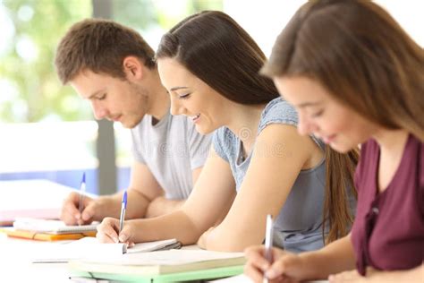 Students Studying Taking Notes In A Classroom Stock Image Image Of