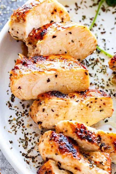 When the surface just starts to smoke, pour in enough oil to lightly coat the bottom of the skillet. Juicy Stove Top Chicken Breasts Recipe - Cravings Happen