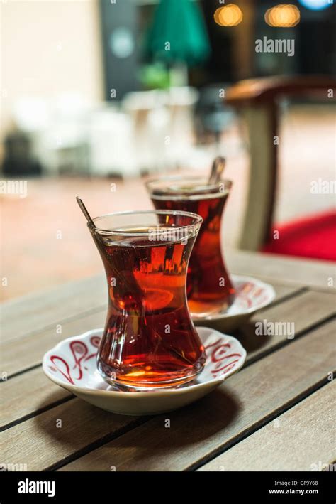 Turkish Tea In Traditional Tulip Glasses On Table Of Street Cafe Stock