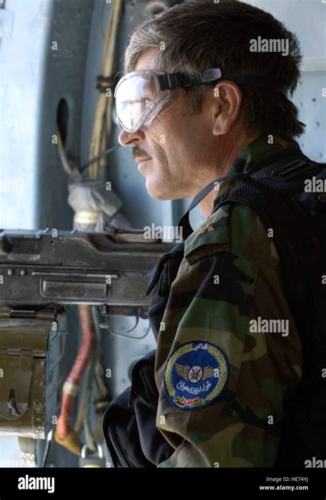 An Mi 17 Helicopter Door Gunner From The Afghan National Army Ana Air