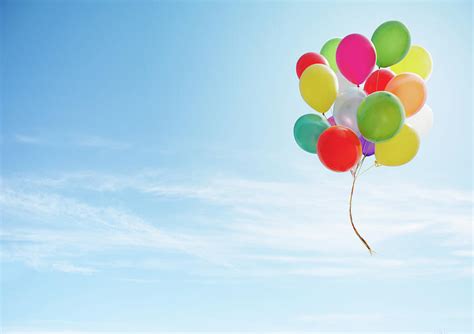 Colorful Bunch Of Balloons Floating In By Luxx Images