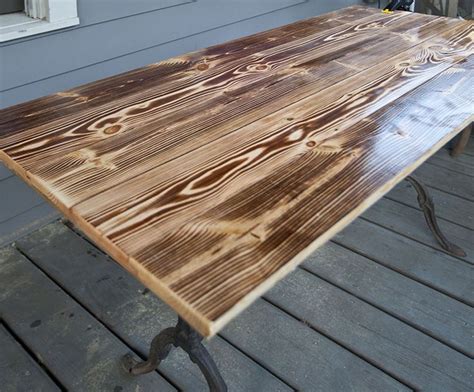 Build a side table with a floating top. Build Your Own Charred Wood Table Top for a Dramatic Look ...