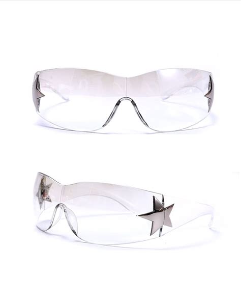 trendy y2k rimless sunglasses with futuristic design with a metal star on each side of the