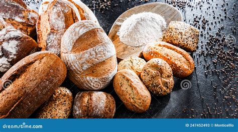 Assorted Bakery Products Including Loafs Of Bread And Rolls Stock Image