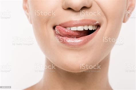 Cropped View Of Beautiful Woman Licking Lips Isolated On White Stock