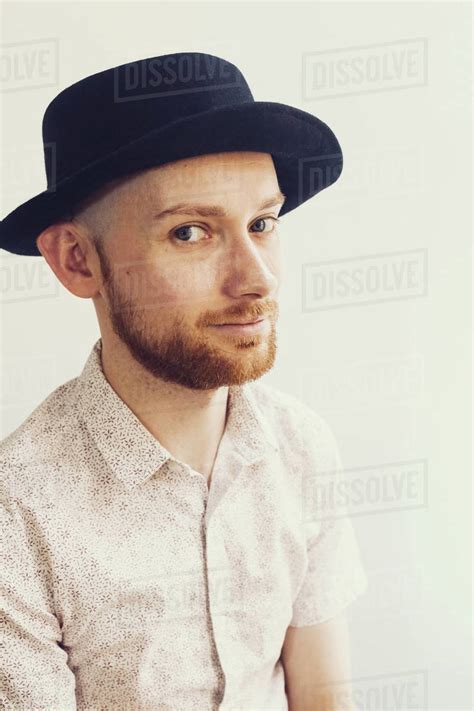 Portrait Of Caucasian Man Wearing Hat Stock Photo Dissolve