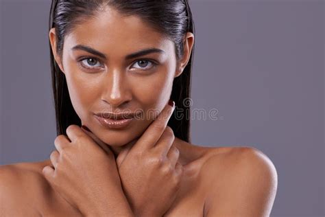 Confidence And Beauty Portrait Of A Beautiful Young Woman Posing In