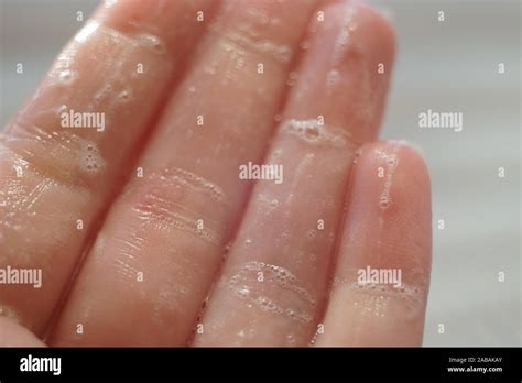 Wet Fingers Hi Res Stock Photography And Images Alamy