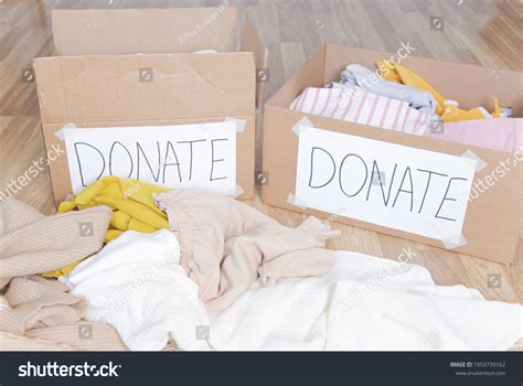 Donation Boxes Clothes On Floor Stock Photo 1959739162 Shutterstock