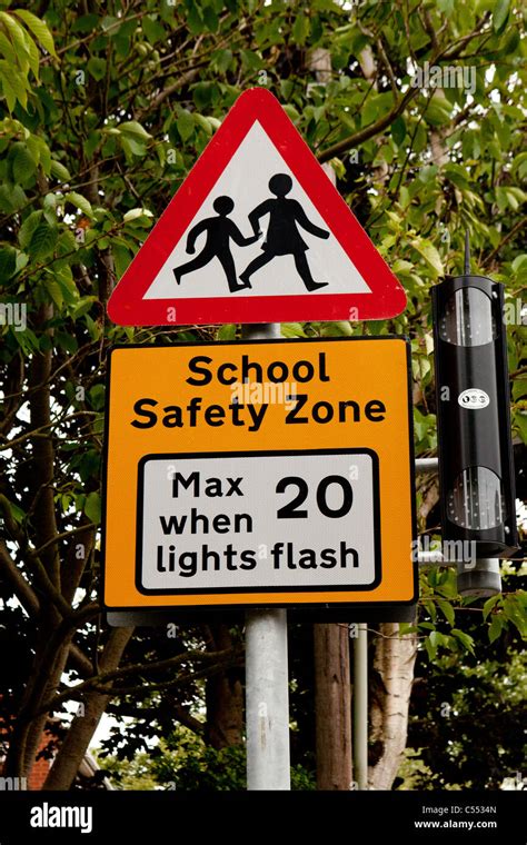 Uk School Safety Zone Street Traffic Warning Sign Stock Photo