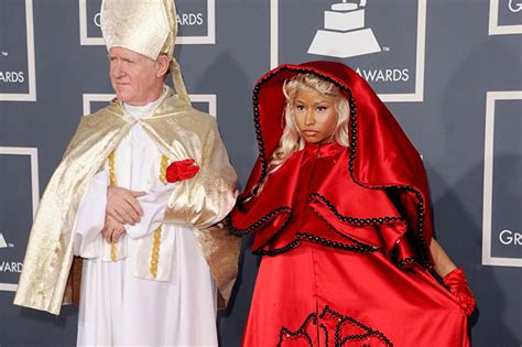 Nicki Minaj Hits The Grammy Awards Red Carpet With The Pope