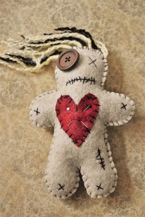 voodoo doll with long hair voo doo doll handmade felt voodoo doll with long yarn hair dark dolls