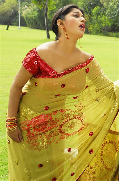 makeupworld actress meera jasmine hot expression stills in saree