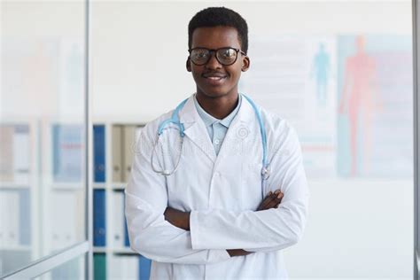 Young African Doctor Posing In Clinic Stock Image Image Of Ethnicity