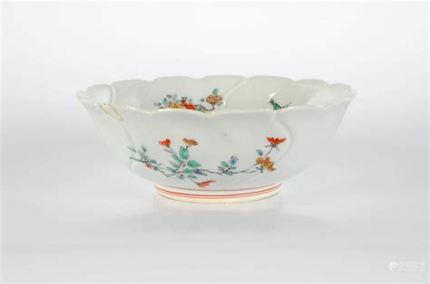 Bidlive A Polychrome Porcelain Bowl With Scalloped Rim