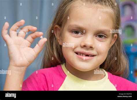 Child Years Old Holding Tooth Hi Res Stock Photography And Images Alamy