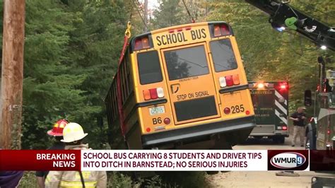 School Bus Carrying 8 Students And Driver Tips Into Ditch In Barnstead