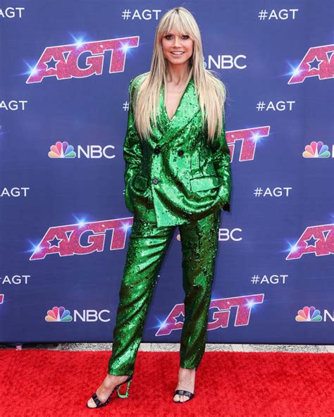 heidi klum shines in sparkling green suit and sculptural logo heels on ‘america s got talent red