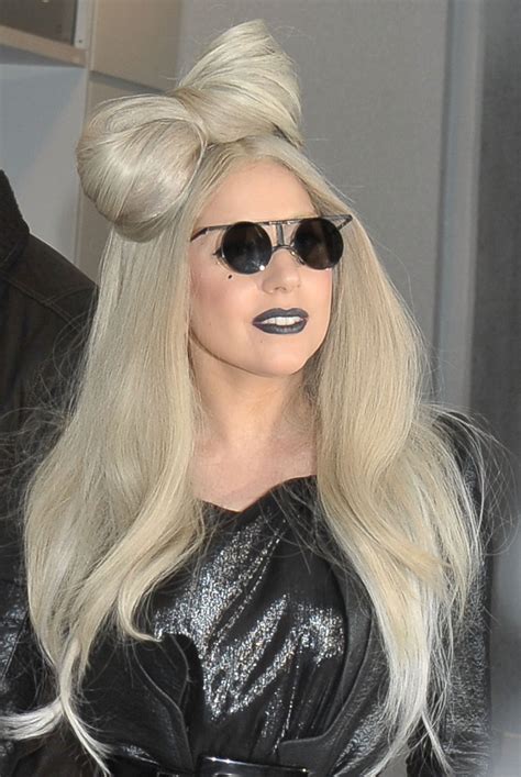 Her hair is blonde and extremely long, and it's usually styled in a huge ponytail and two big, black bows on each side of her hair. Lady Gaga Revives The Blonde Hair Bow In Japan (PHOTOS ...