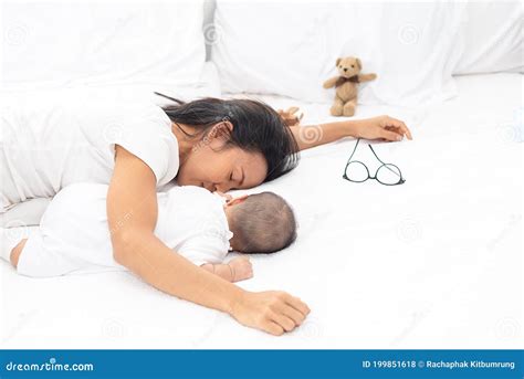 Being Mom Is So Exhausted Tired Mother Laid In Bed With Newborn Baby