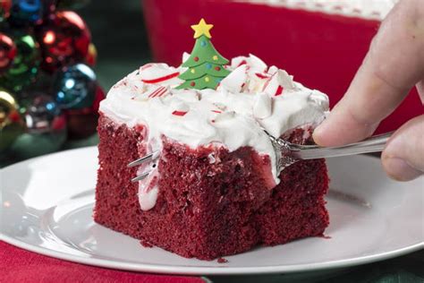 Red velvet poke cake infused with cream cheese flavoring in this million dollar easy secret! Holiday Poke Cake | MrFood.com