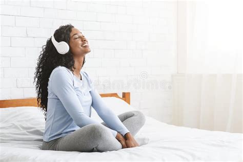 Joyful Young Girl Listening To Music In Bedroom Stock Image Image Of