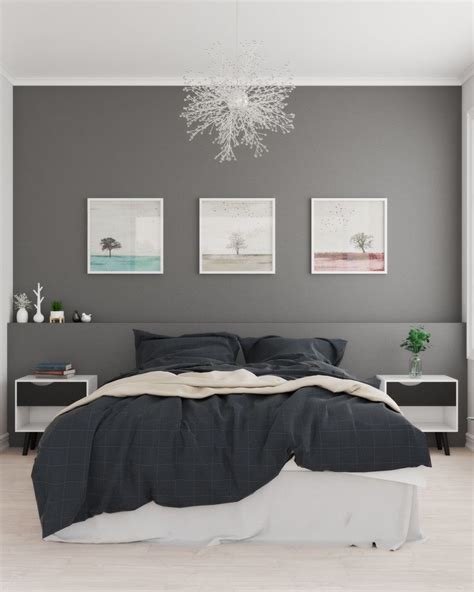 A chic bedroom with a dark floral accent wall and a blanket and throws to match its colors. Scandinavian Bedroom with Dark Gray Accent Wall in 2020 ...