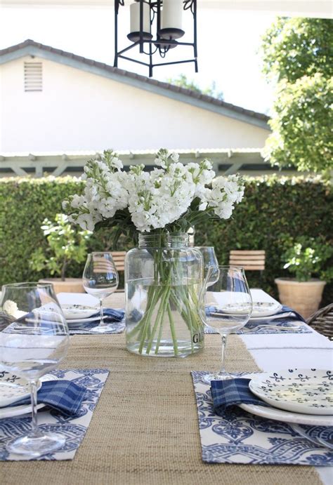 With any luck, you'll be able to check everything off the party planning checklist and have some fun, too. Simple Summer Tablescape in Blue and White | Outdoor table settings, Tablescapes, Blue, white