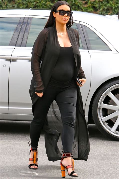 Kim Kardashian Shows Off Baby Bump In Sheer Dress At Givenchy Spring
