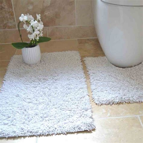This bathroom mat set is available in 3 different colors which include grey, beige, and brown. 100% Cotton Bath Set | White | Chenille | Tonys Textiles