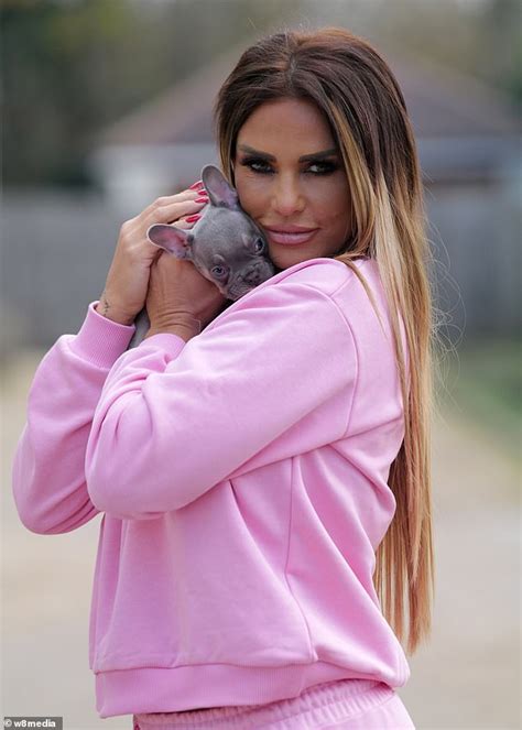 Katie Price Looks Delighted As She Plants Kisses On Her Second New