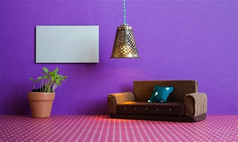 A Purple Living Space Featuring Deep Purple Walls And Pink Flooring