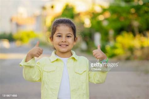 Thumbs Up Girl Photos And Premium High Res Pictures Getty Images