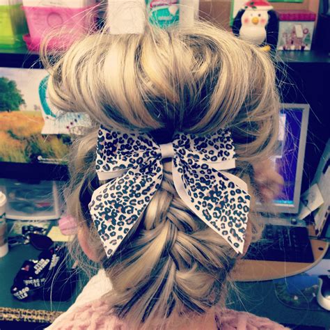 a french braided messy bun with a bow i did on my hair model victoria messy bun with braid
