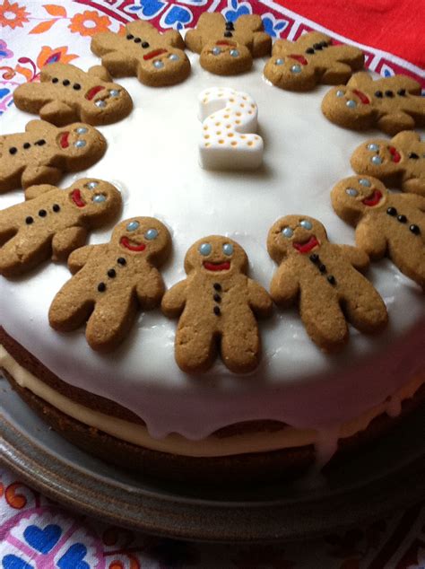 Birthday cakes are often layer cakes with frosting served with small lit candles on top representing the celebrant's age. gingerbread man cake | Gingerbread cake, How to make cake, Gingerbread