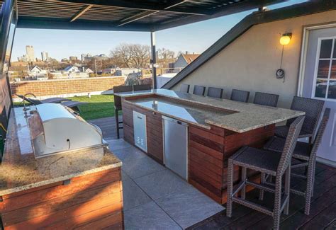 Rooftop Deck With Outdoor Kitchen And Tv Denver Landscape Design