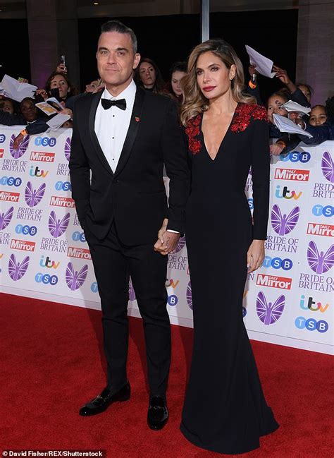 Ayda Field Shares A Playful Video Of Husband Robbie Williams Diving In