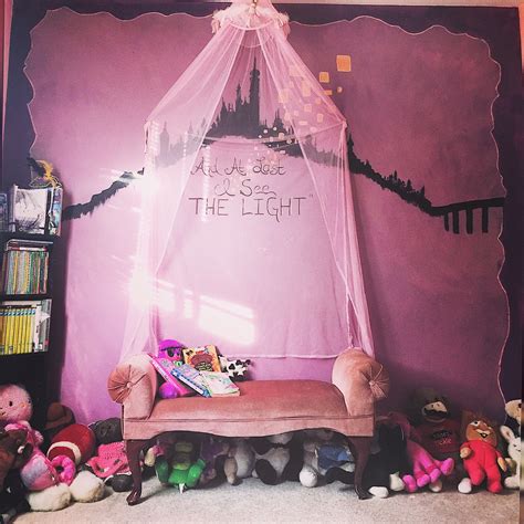 The only thing this room could add. Tangled inspired girls bedroom. Reading area with fainting ...