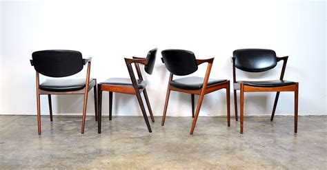 Select Modern Set Of Four Kai Kristiansen Model 42 Rosewood Dining Chairs