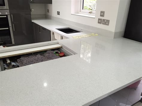 Quartz worktops have the feel and weight of natural stone and due to their colour consistency, they are better than any other natural stone. Starlight White Quartz worktops by The Marble Warehouse ...