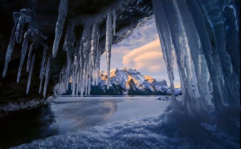 1366x849 Cave Ice Mountain Winter Sunrise Snowy Peak Lake Banff