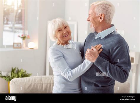 Happy Elderly Couple Dancing Waltz And Smiling Stock Photo Alamy