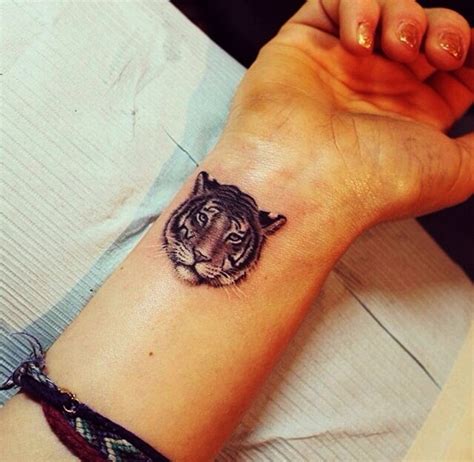 The sun and moon's symbolic picture's imprints are such minimalistic designs, meaning the eternal cycle of day and night. 40 Awesome Wrist Tattoo Ideas For Inspiration