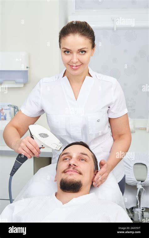 Man Having Laser Treatment At A Beauty Clinic Stock Photo Alamy