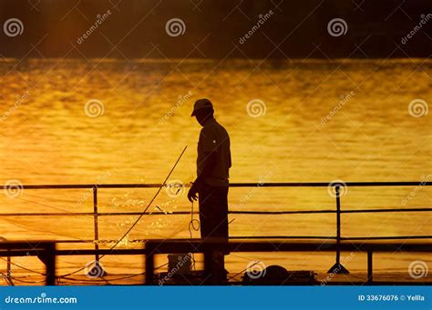 Fisherman In The Sunset Stock Photo Image Of Toil Lakes 33676076