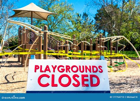 Playgrounds Closed Sign With Blurred Outdoor Children Playground Stock