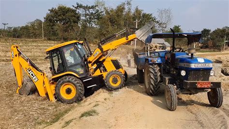 Jcb Machine Loading Dirt In Dump Truck And Tractor Jcb Working On